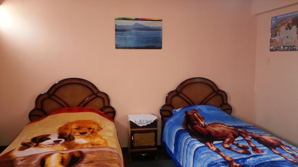 Hostal Villa Imperial Yunguyo Quarto foto
